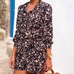 LOFT Black and Cream Long Sleeve romper .